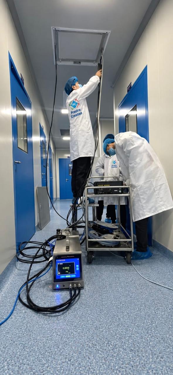 Prestro Creation technicians working in a controlled cleanroom
